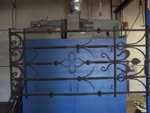 Wrought iron gate after rust removal and powder coating